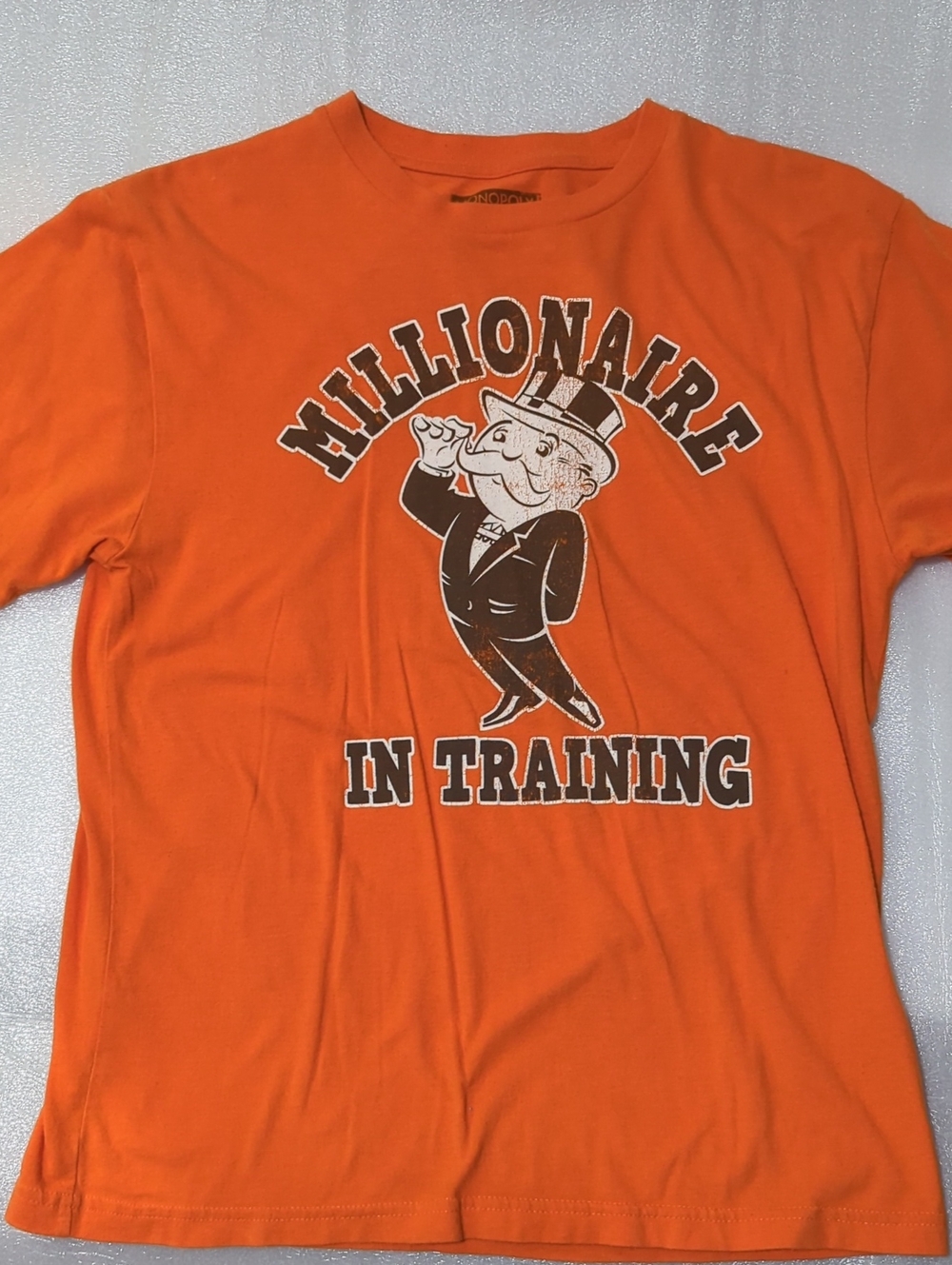 Boy's Orange 'Millionaire In Training' Graphic Tee Size Large